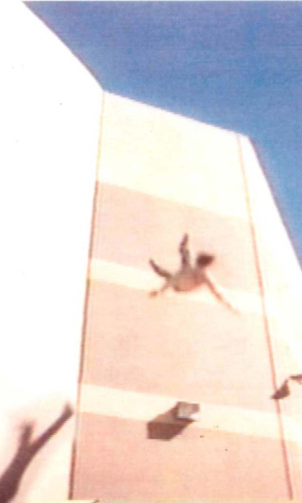 Jack falling backward off of a tall building